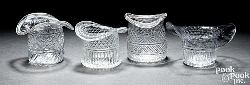 FOUR BLOWN THREE-MOLD CLEAR GLASS HATSFour