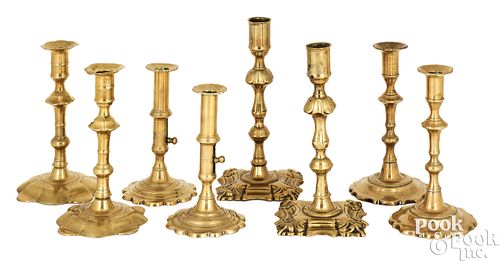 FOUR PAIRS OF ENGLISH BRASS CANDLESTICKSFour 2faf306