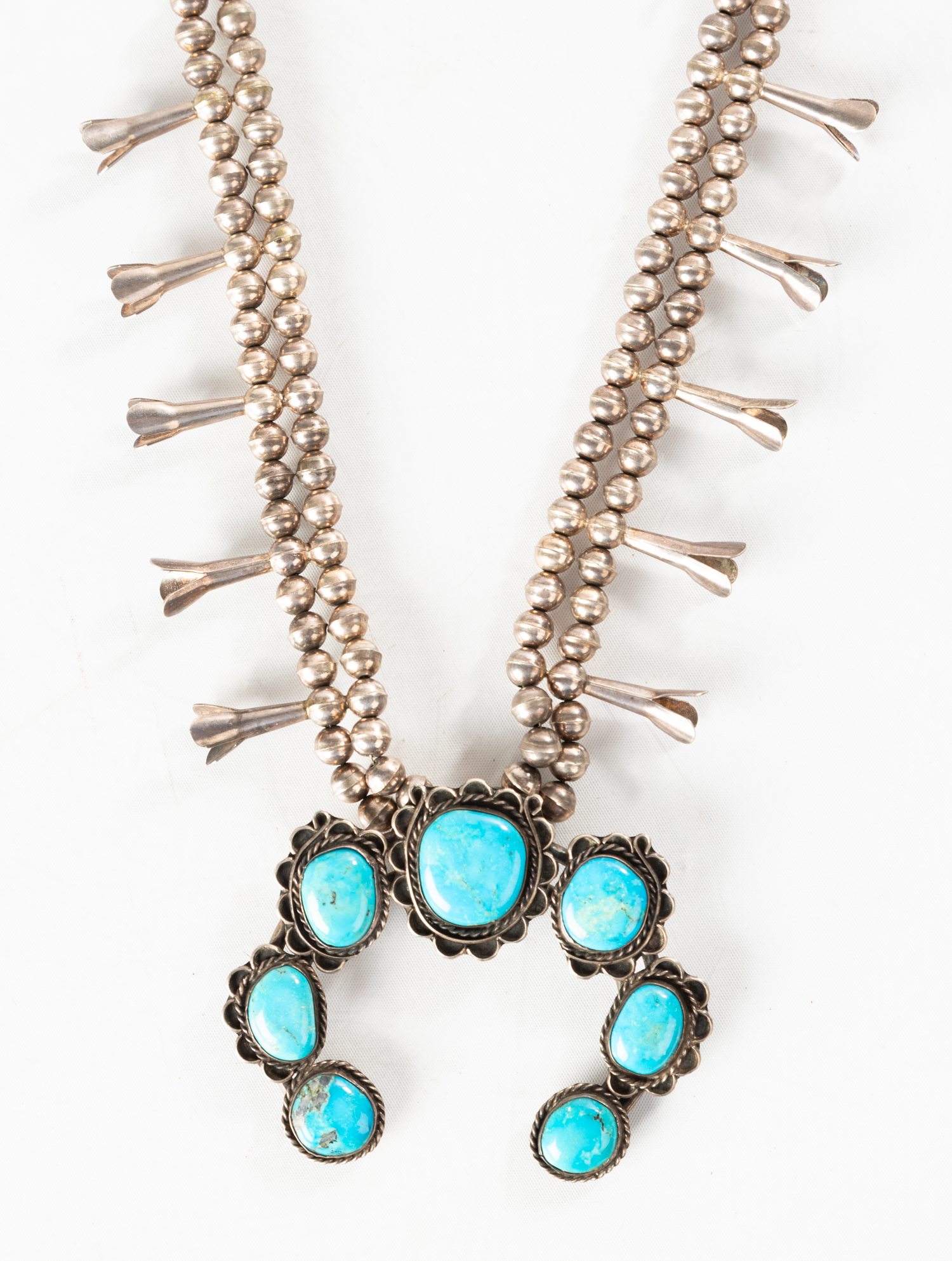 NAVAJO TURQUOISE & SILVER SQUASH BLOSSOM