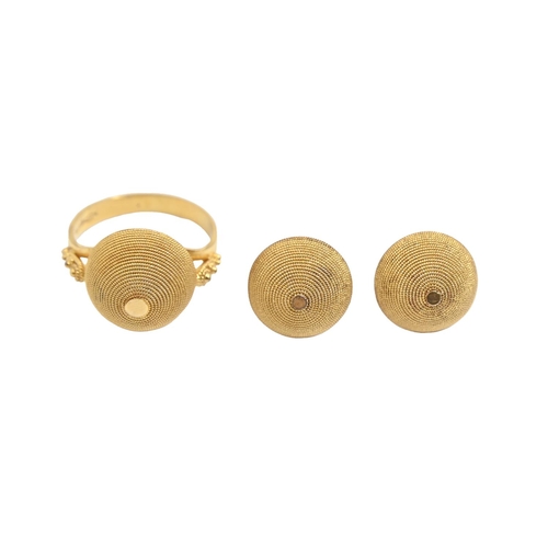 A gold ring and pair of matching ear