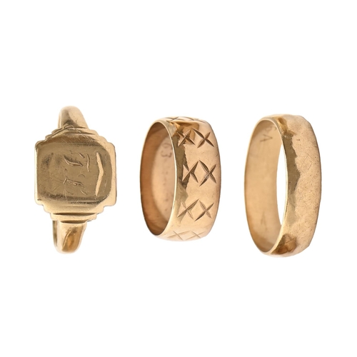 A 9ct gold signet ring and two wedding