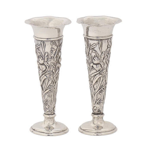 A pair of Edwardian silver vases, die