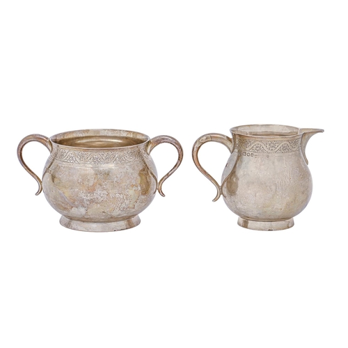 A George V silver cream jug and 2faf9e8