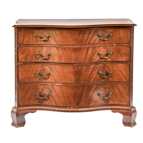 A serpentine mahogany chest of drawers,