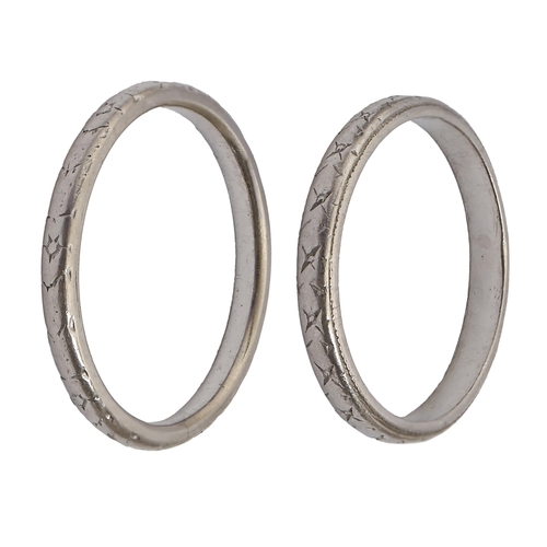 Two platinum wedding rings, marked PLATINUM,