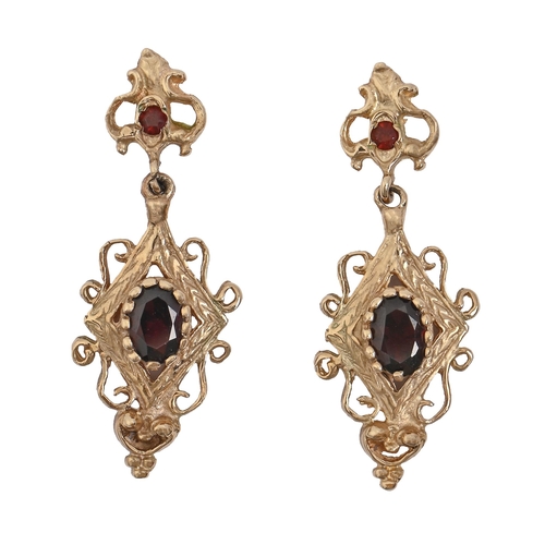 A pair of garnet earrings in gold  2fafd05