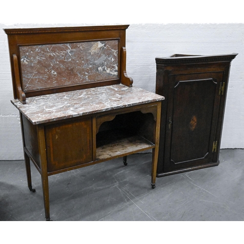 An Edwardian mahogany washstand, with