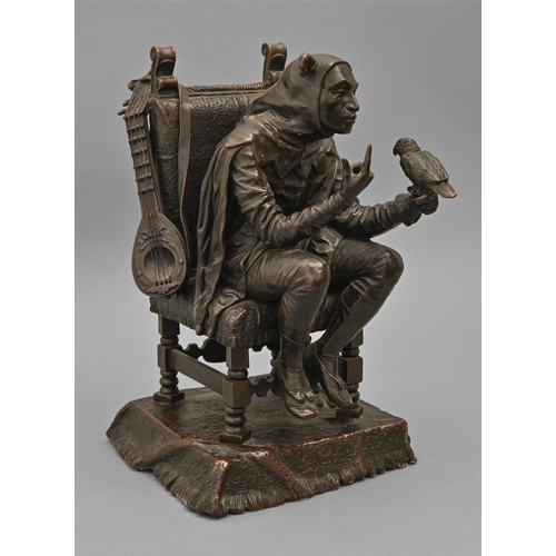 A bronze sculpture of a jester training