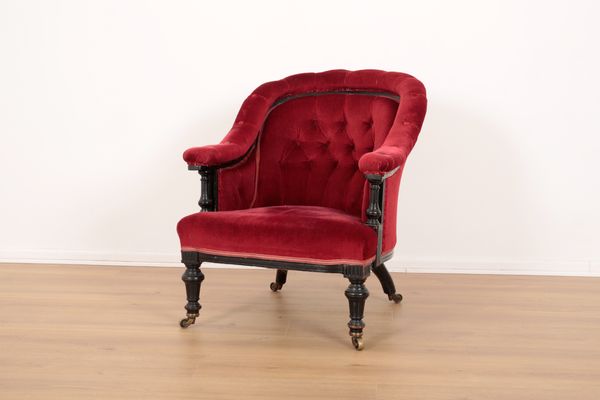 A VICTORIAN EBONISED TUB ARMCHAIR 2fb01ec