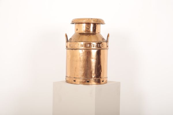 A COPPER MILK CHURN of cylindrical form