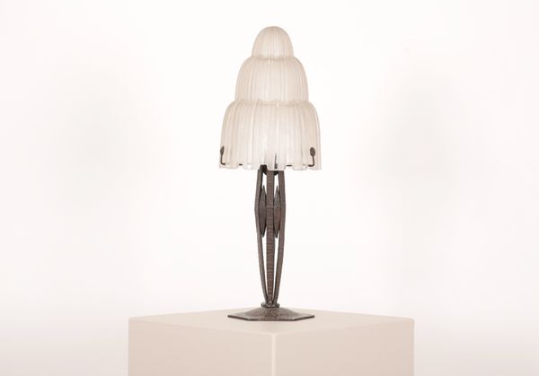 AN ART DECO LAMP WITH EDGAR BRANDT STYLE