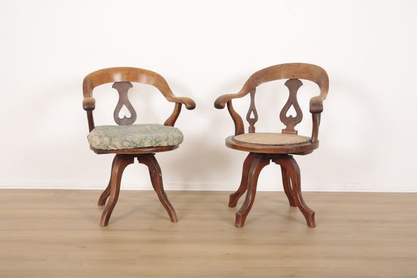 A MATCHED PAIR OF OAK REVOLVING 2fb025b