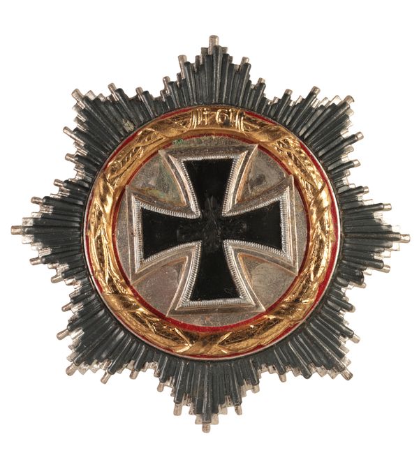 A 1957 GERMAN CROSS in gold multi piece 2fb0237