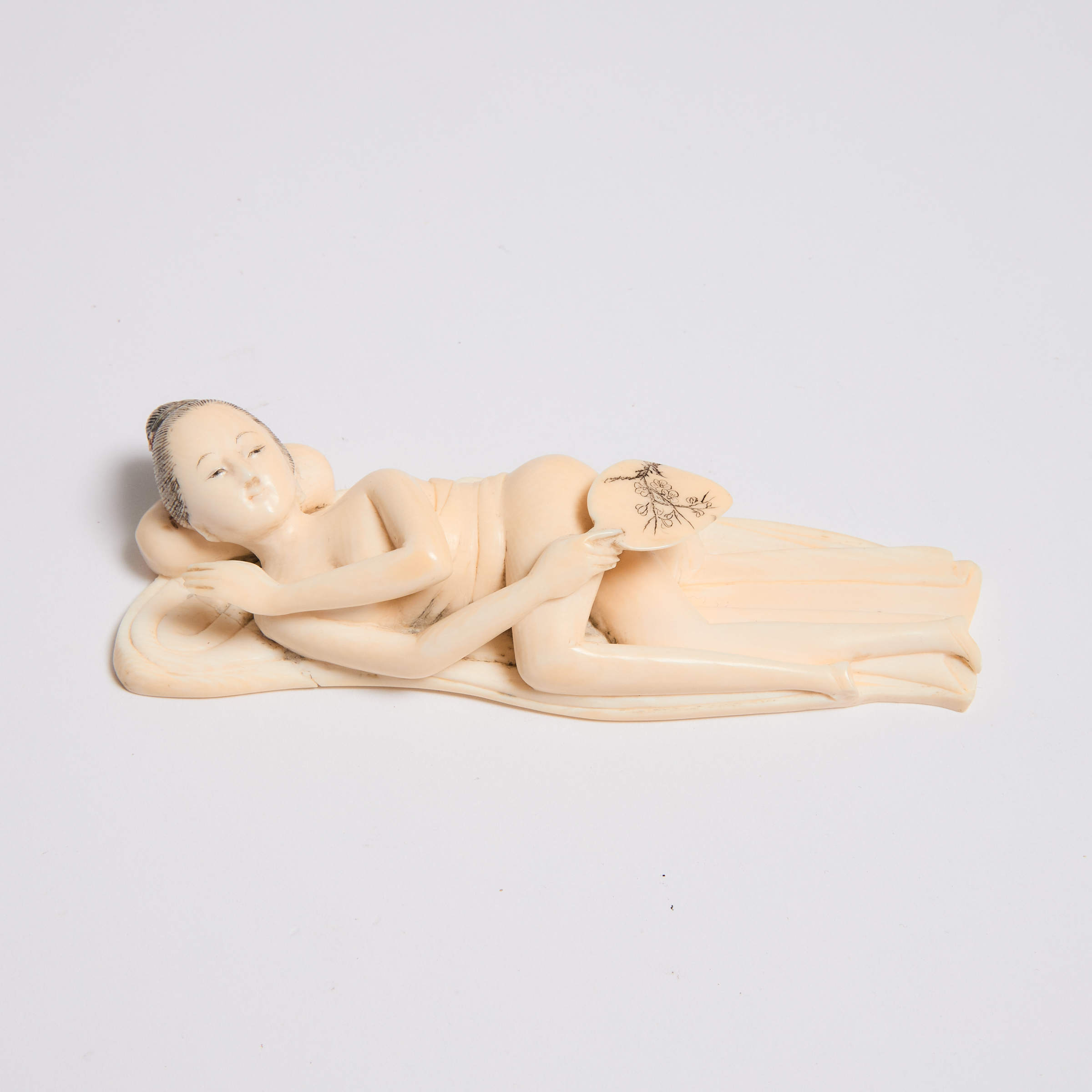 An Ivory Figure of a Reclining 2fb0669