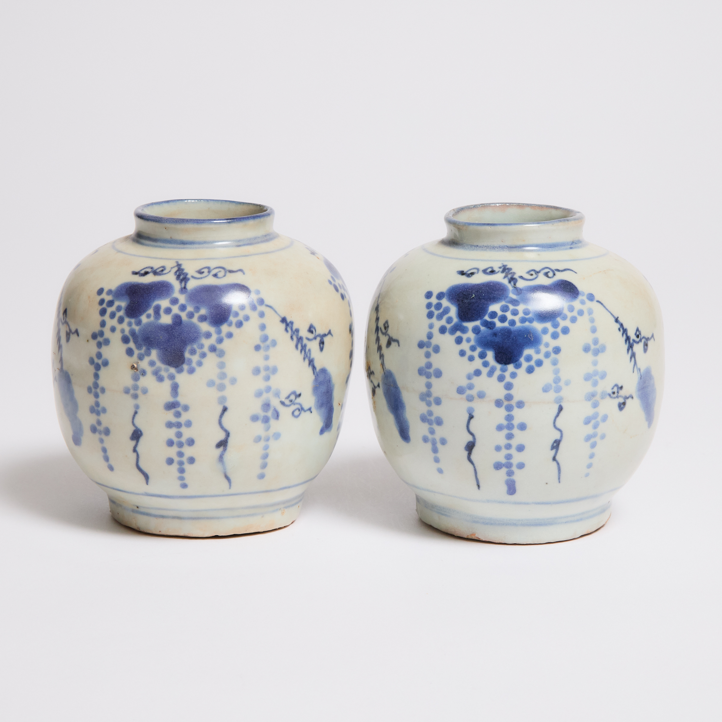 A Pair of Blue and White Grape Jars,