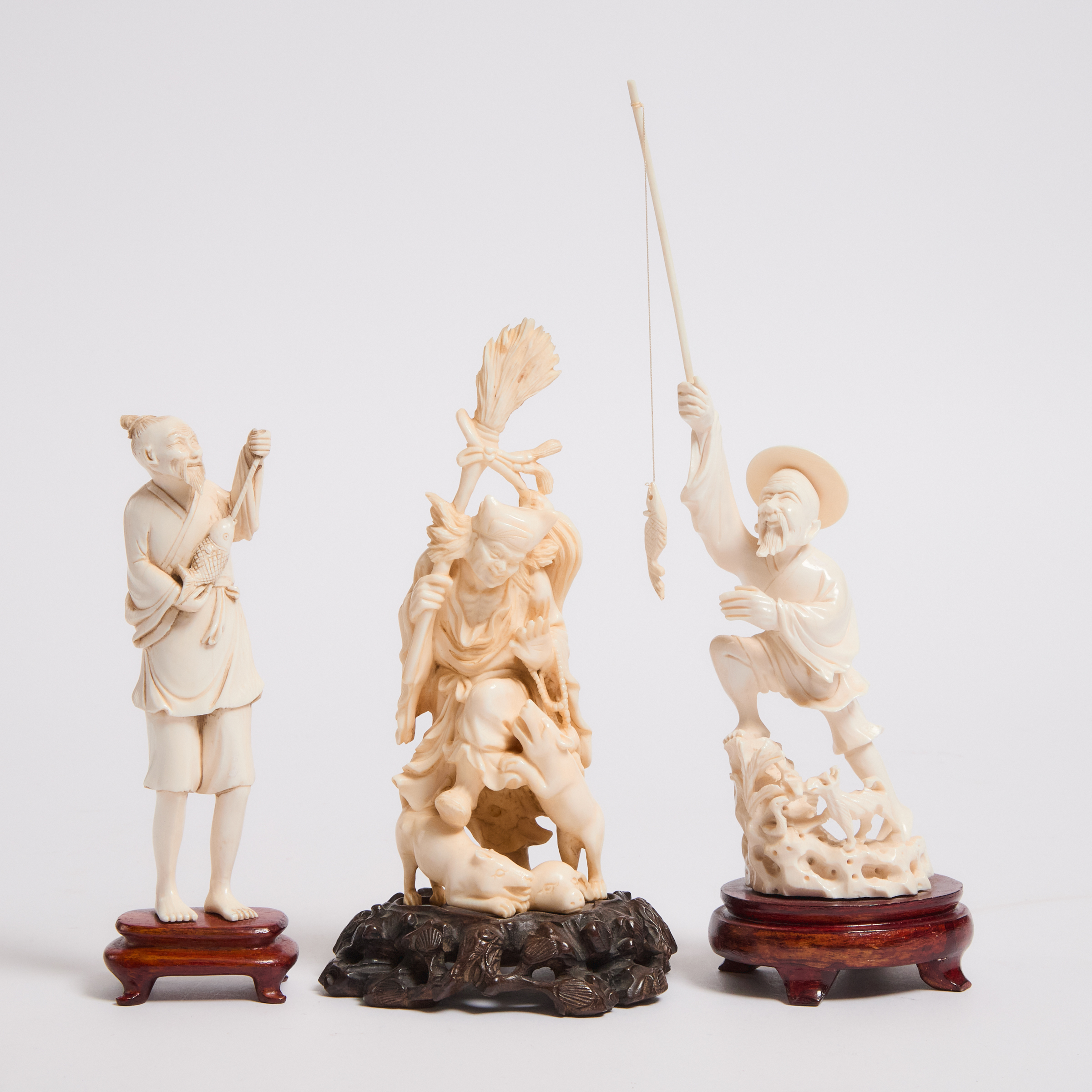 A Group of Three Ivory Figures, Early