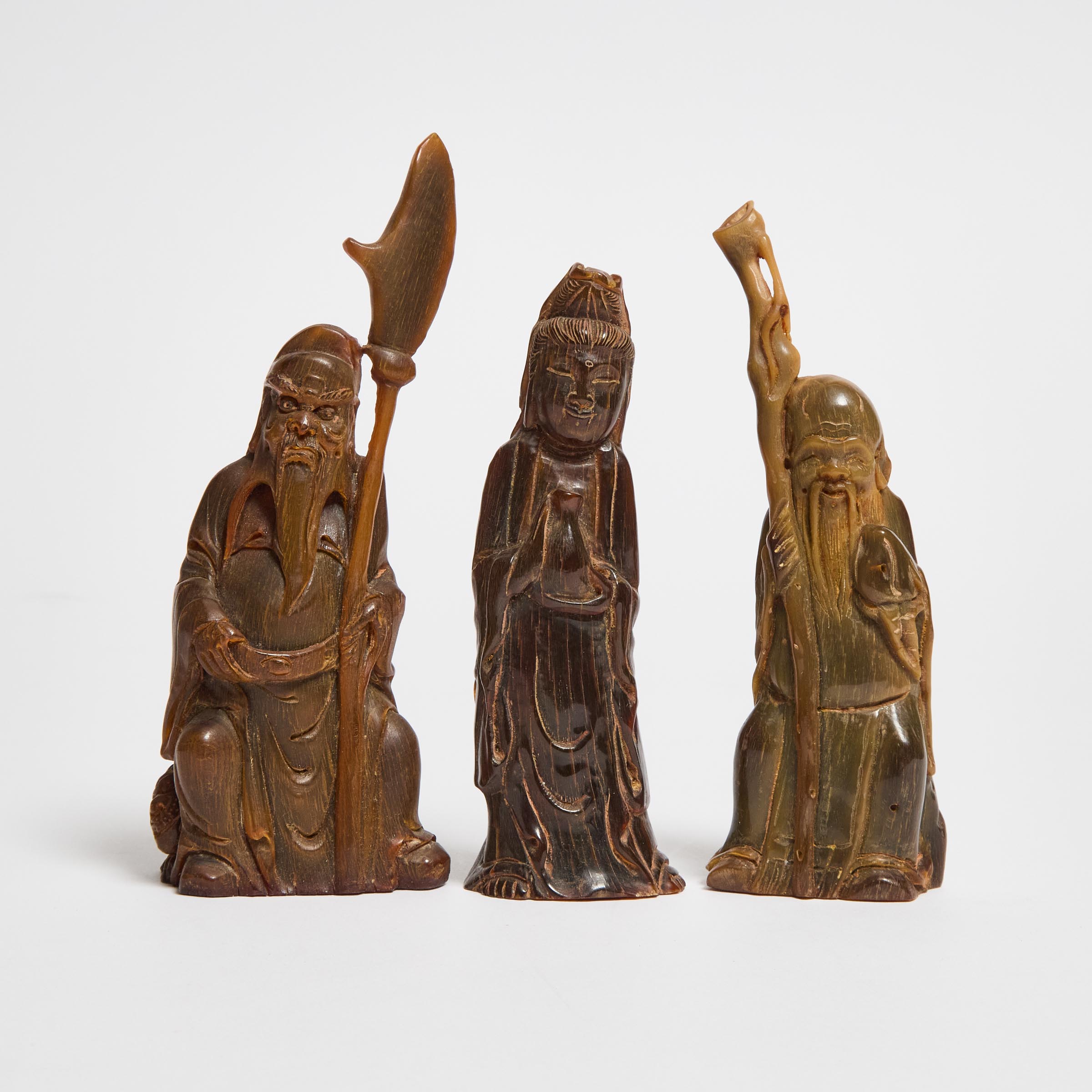 A Group of Three Carved Horn Figures 2fb070a