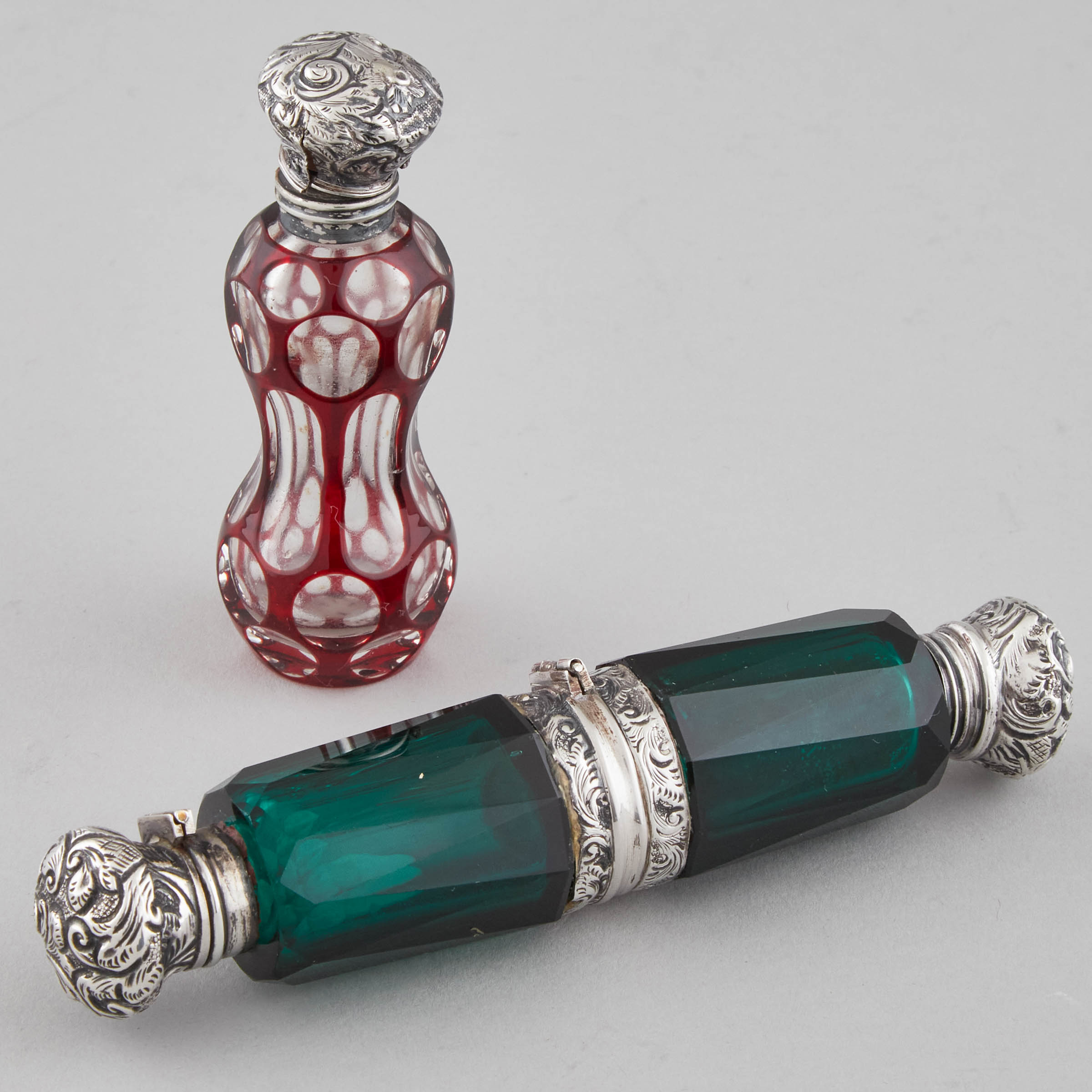 Two Silver Mounted Coloured Glass Perfume