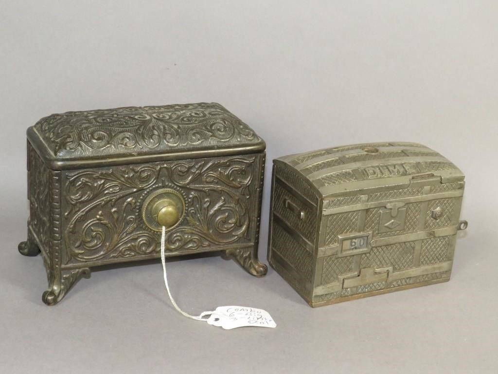 2 CAST IRON TRUNK SHAPED BANKSca  2fb0ee3