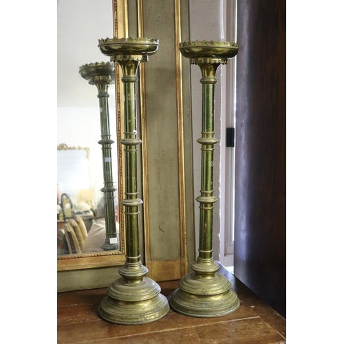 Tall pair of antique brass church prickets