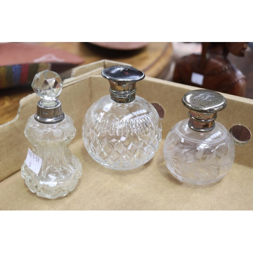 Three antique perfume bottles, approx