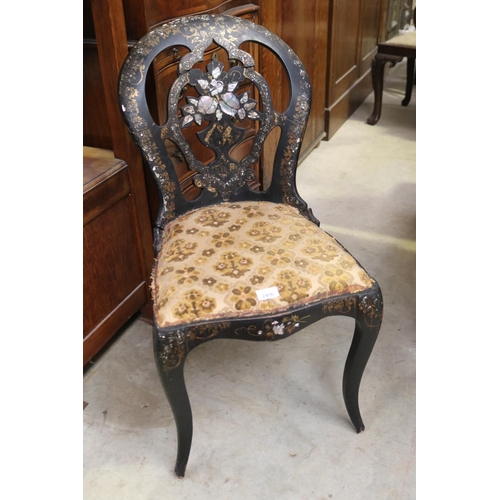 Mother of pearl inlaid chair in distressed