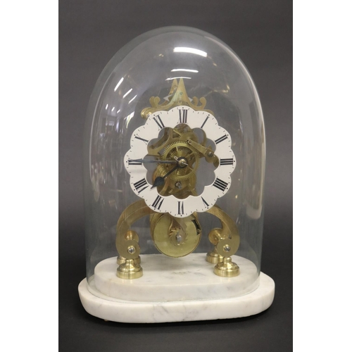 Brass skeleton clock under glass 2fb1964