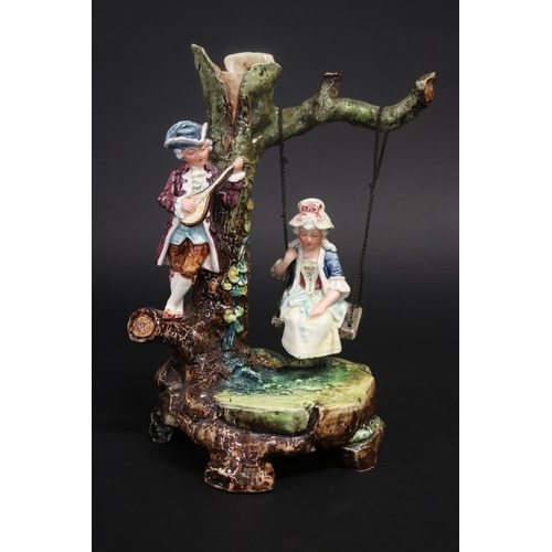 Majolica courting couple on swing  2fb197e