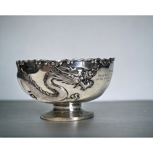 A CHINESE SILVER DRAGON BOWL.Early 20th