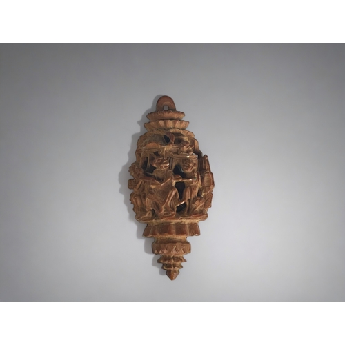 A carved Hediao nut.Chinese, Qing dynasty.Deep