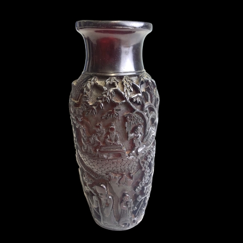 A Chinese deep carved Cherry Amber vase.