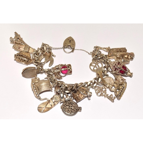 Large silver charm bracelet to include