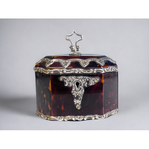 A TORTOISESHELL AND SILVER MOUNTED TEA