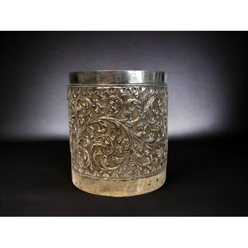 ANTIQUE EMBOSSED WHITE METAL JAR.Stylised