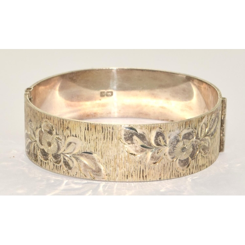 Solid silver bangle with half flower