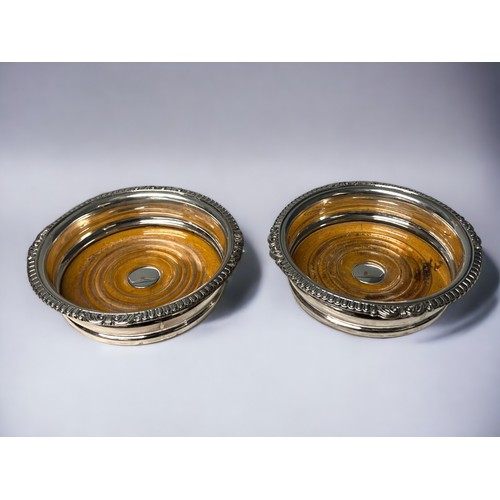 Two Victorian silver plate wine coasters.Diameter