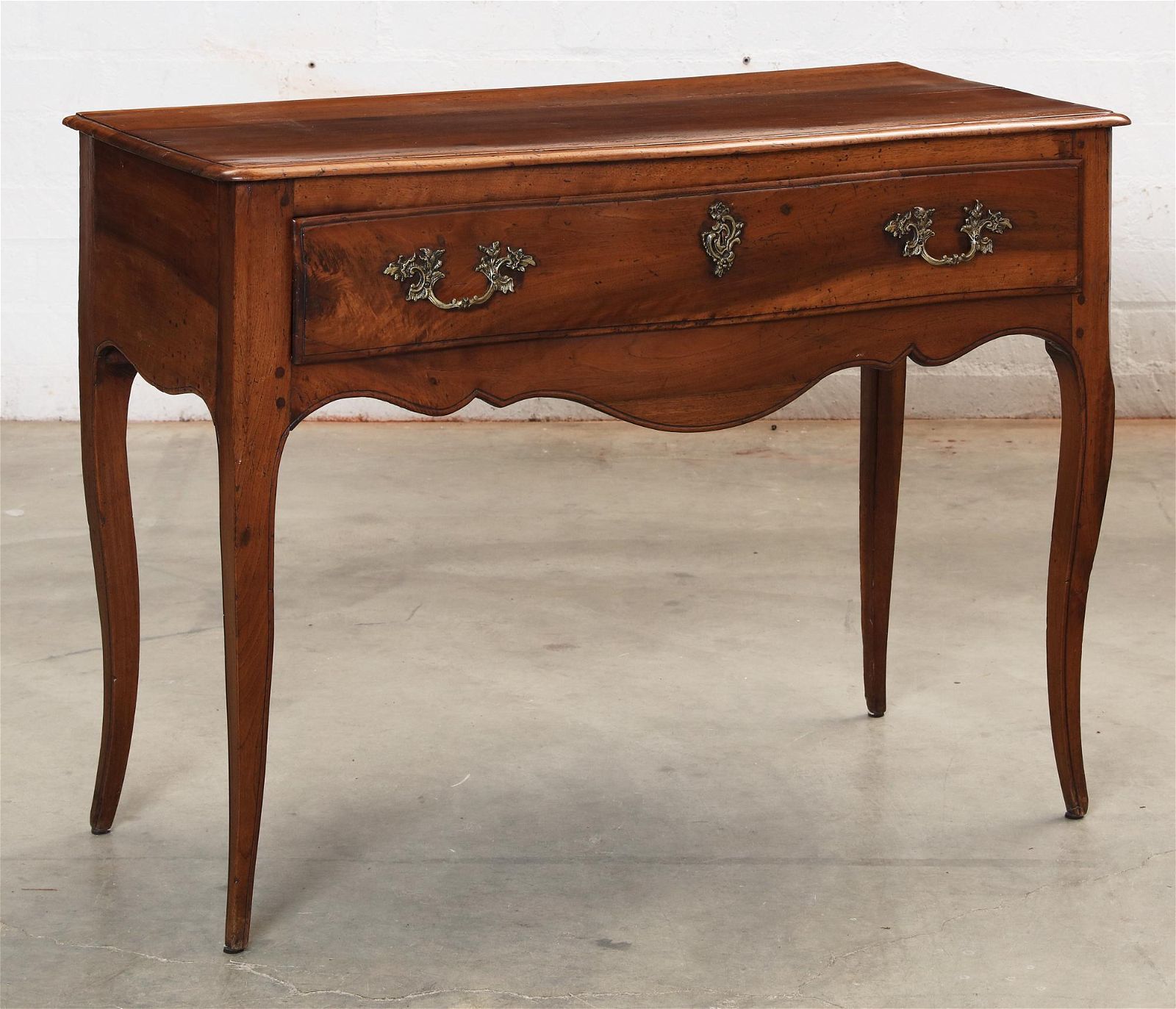 A LOUIS XVI PROVINCIAL WALNUT SIDE TABLEA