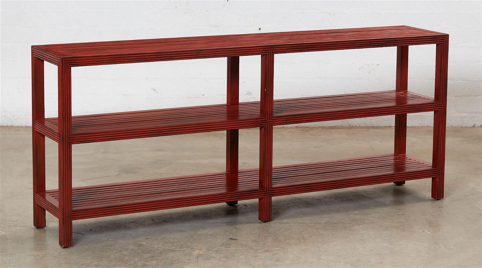 A JASPER RED PAINTED THREE TIER 2fb27c2