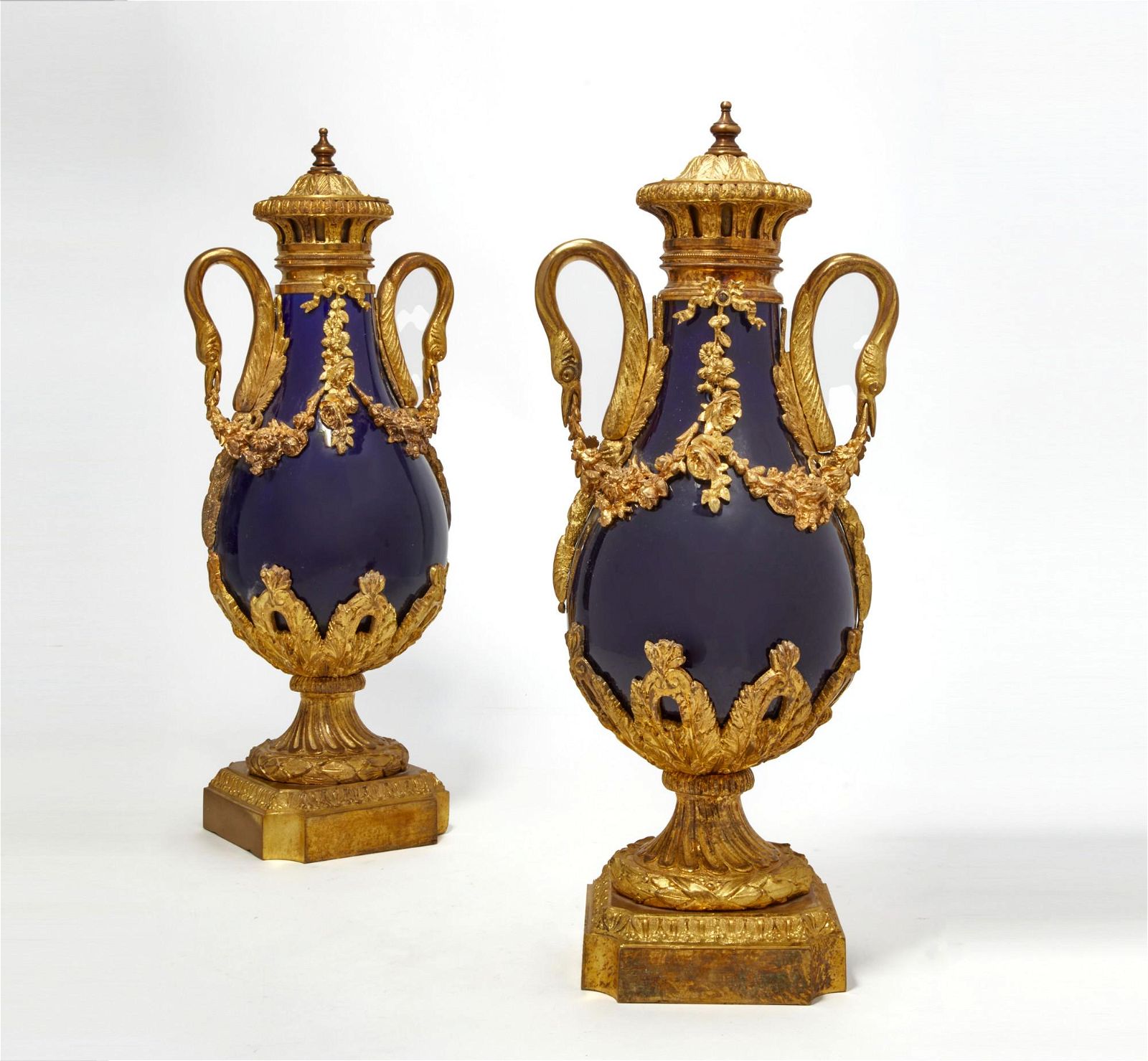 A PAIR OF LOUIS XVI STYLE BLUE PORCELAIN