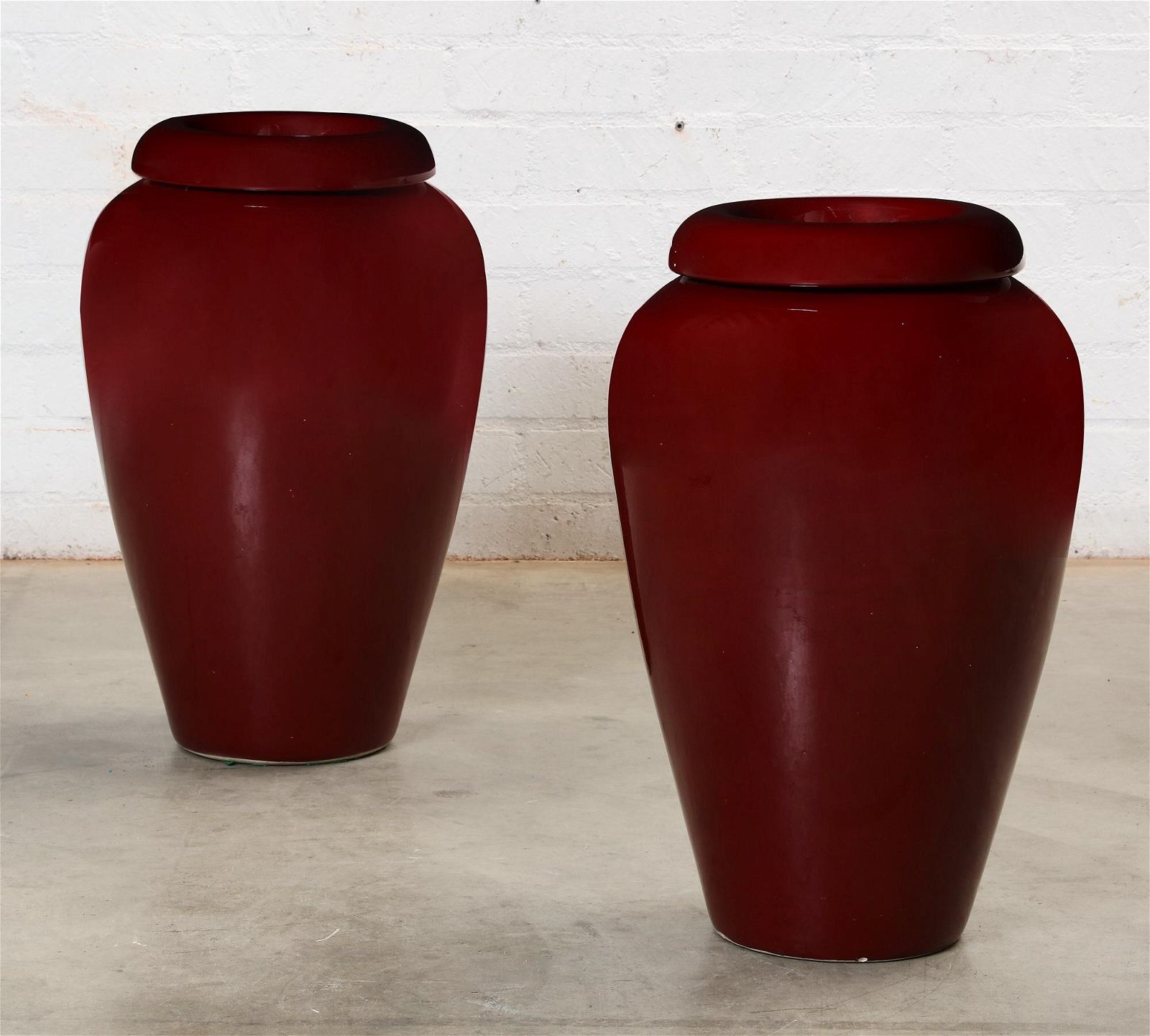 A PAIR OF LARGE RED GLAZED PORCELAIN 2fb2953