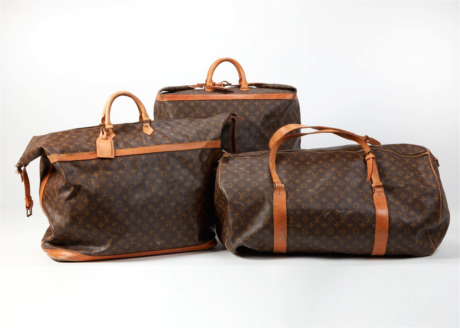 THREE LOUIS VUITTON LEATHER AND CANVAS