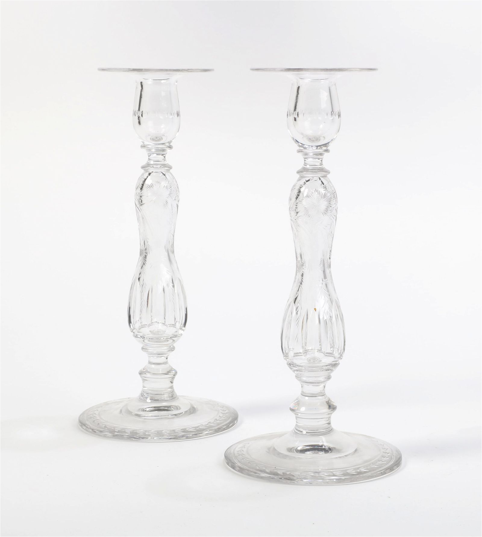 A PAIR OF HAWKES CLEAR GLASS CANDLESTICKSA