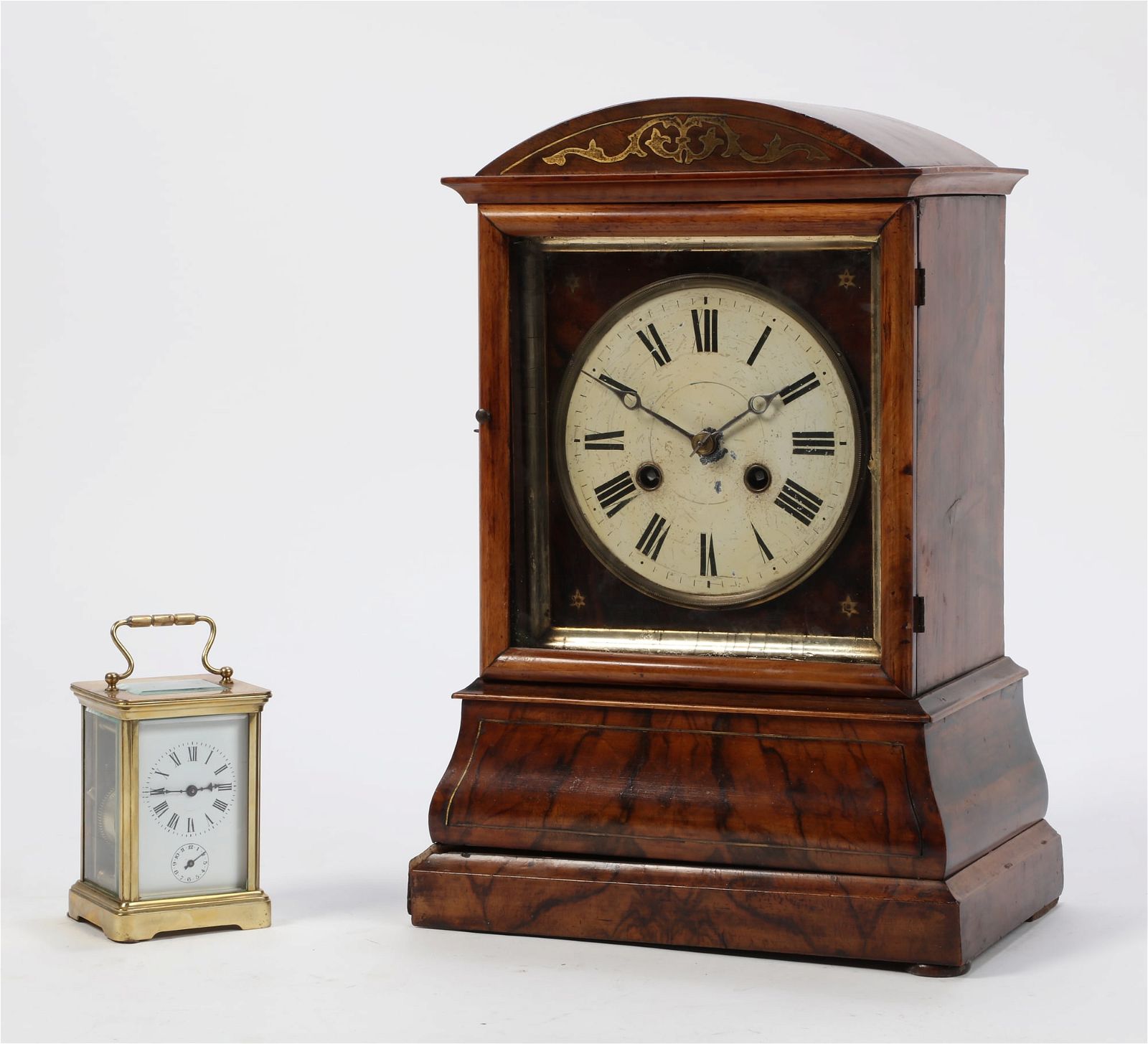 A FRENCH BRASS CARRIAGE TIMEPIECE WITH