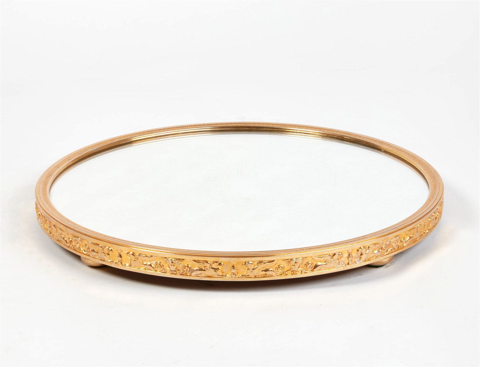 AN EMPIRE STYLE GILT METAL CIRCULAR