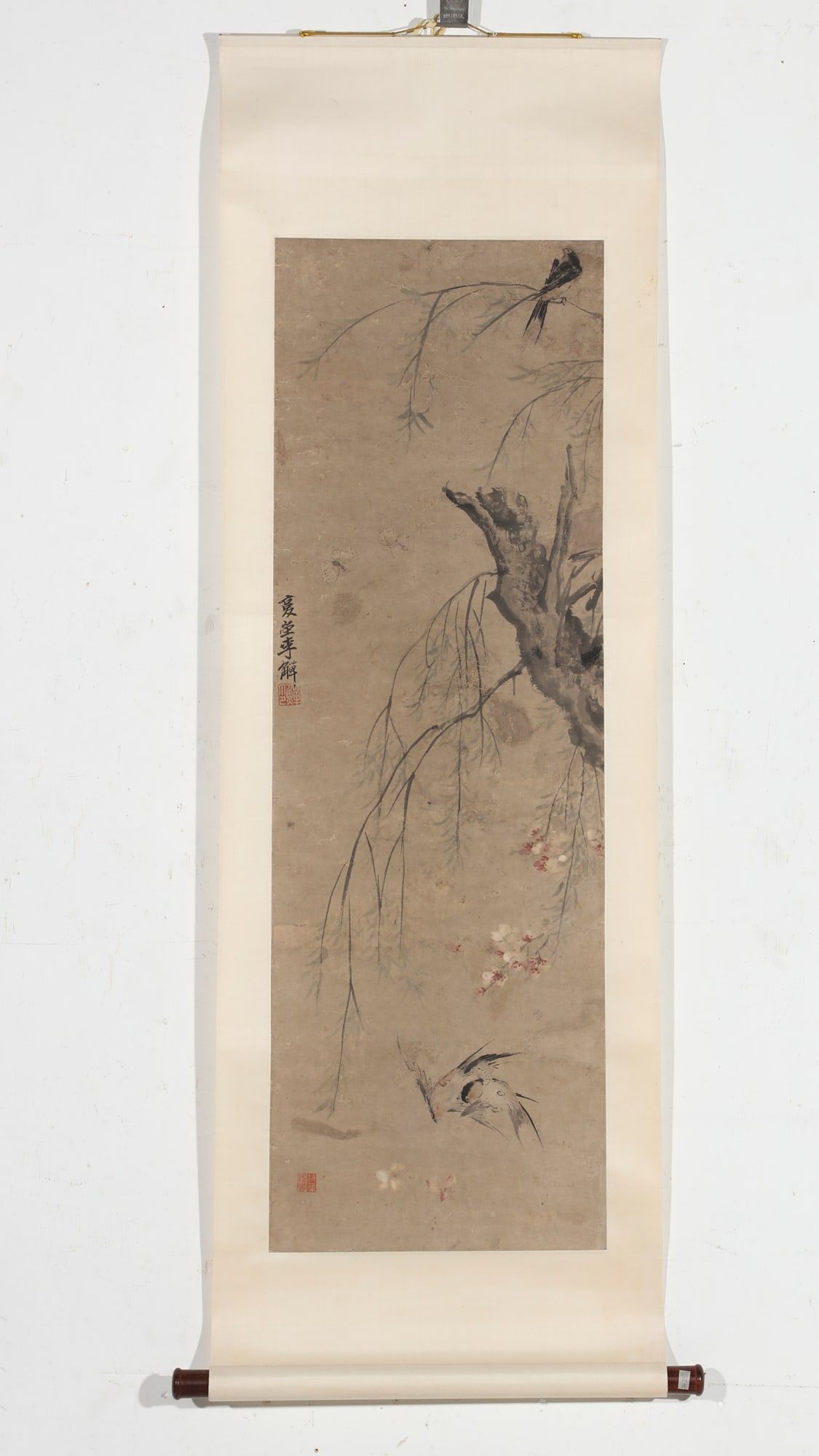 A CHINESE SCROLL DEPICTING BIRDS AND