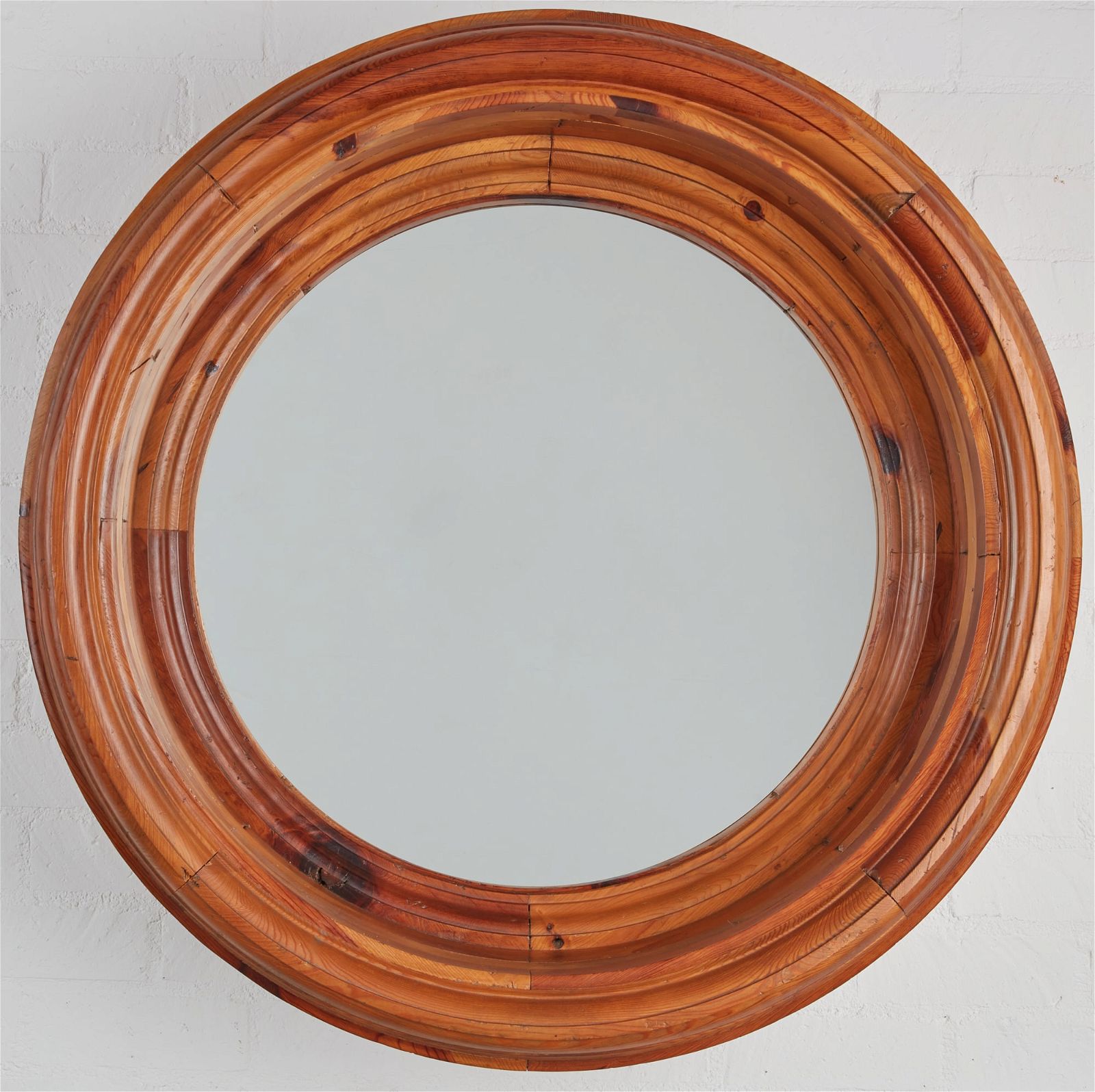 A RALPH LAUREN CIRCULAR STAINED PINE