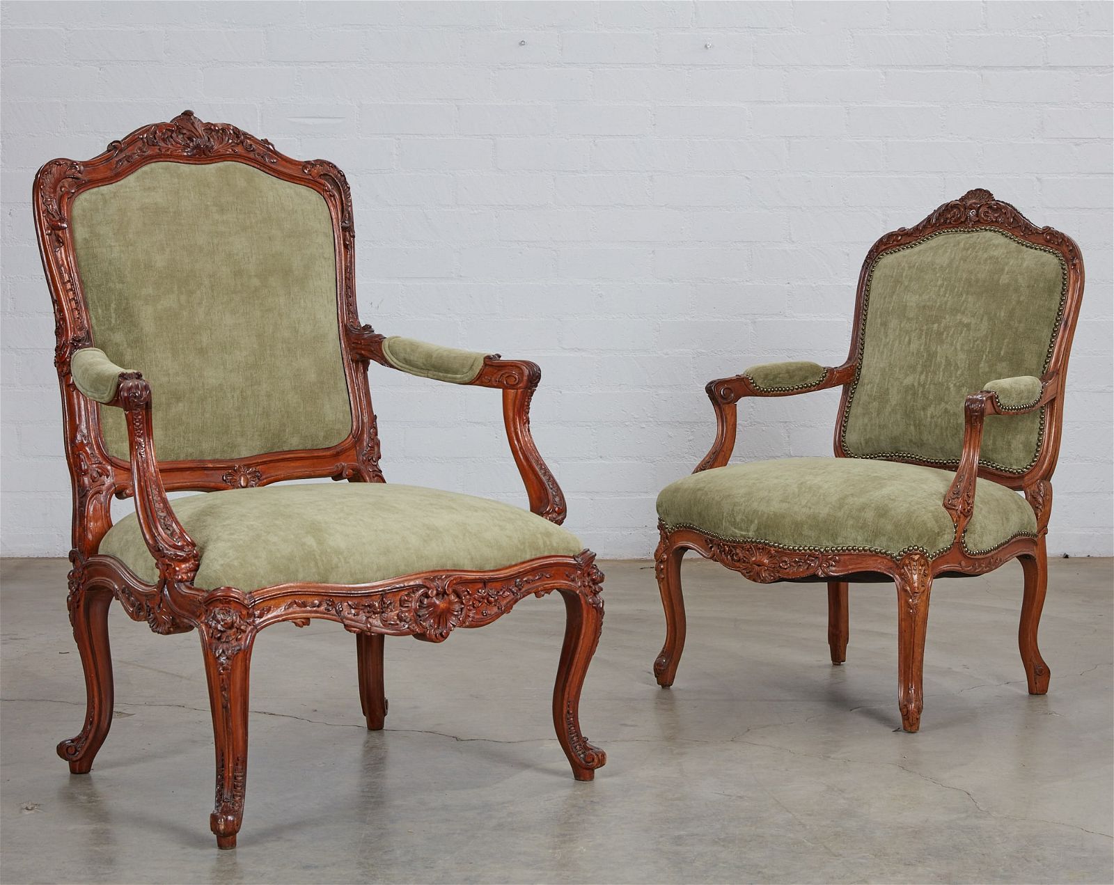 TWO LOUIS XV STYLE STAINED WALNUT FAUTEUILSTwo