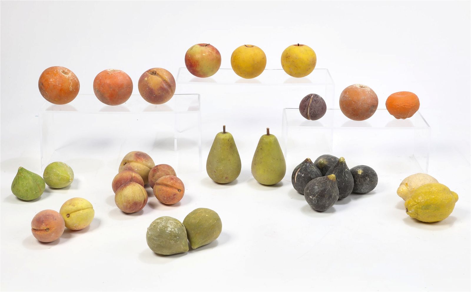 A COLLECTION OF PAINTED MARBLE MODELS