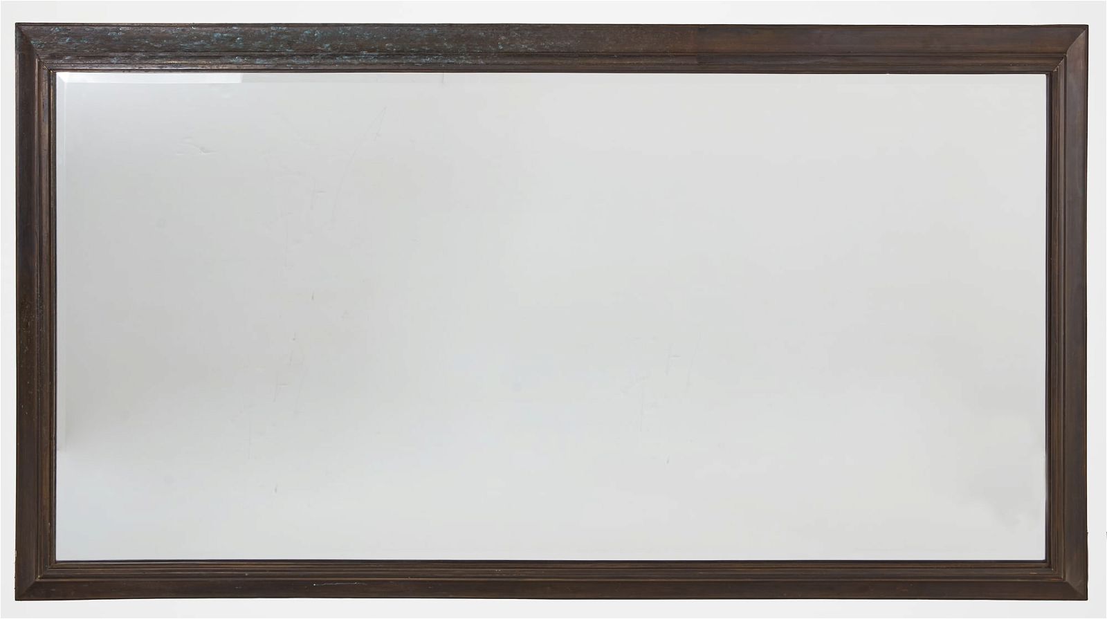 A PATINATED METAL FRAMED MIRROR  2fb3911