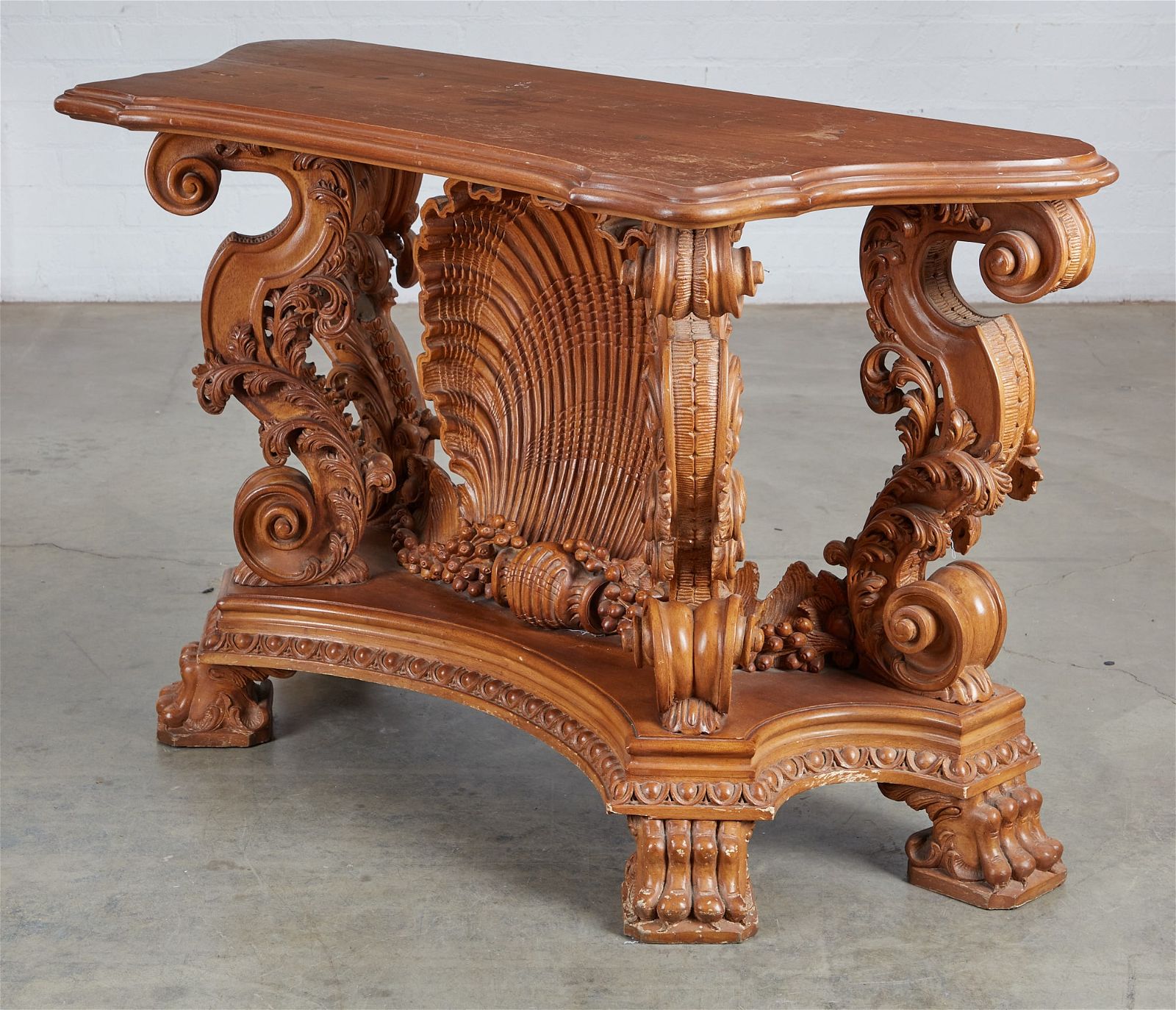 AN ITALIAN BAROQUE STYLE MIXED WOOD